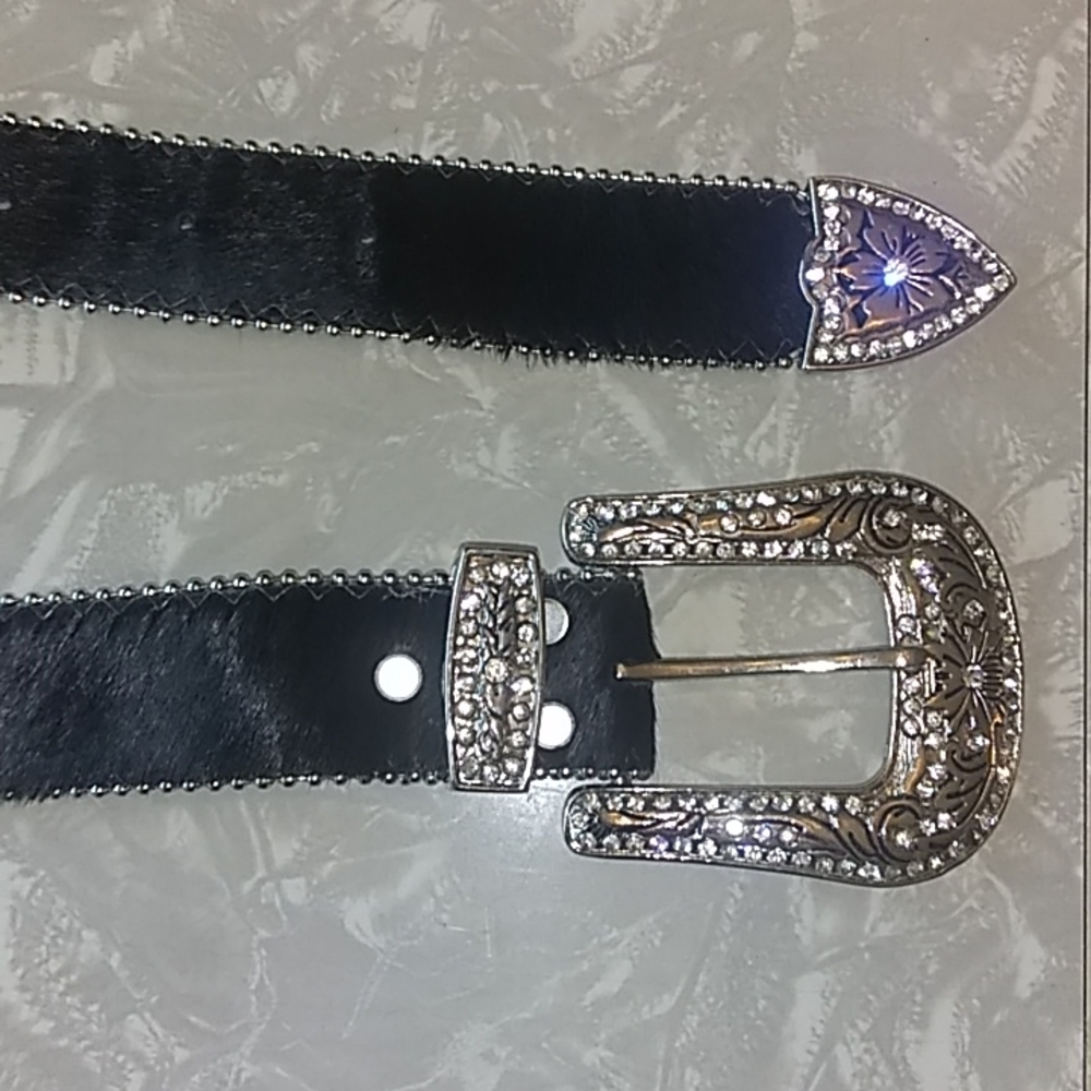 Heavily rhinestone designer belt.